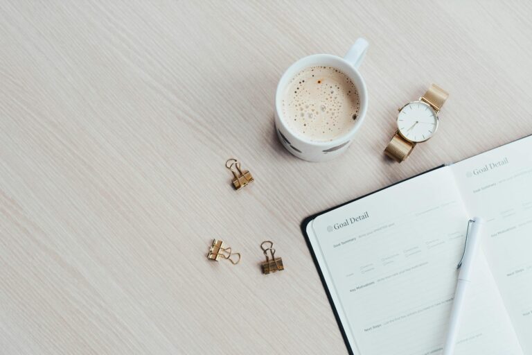 2026 planners and journals - image of 2026 planner with clips and coffee
